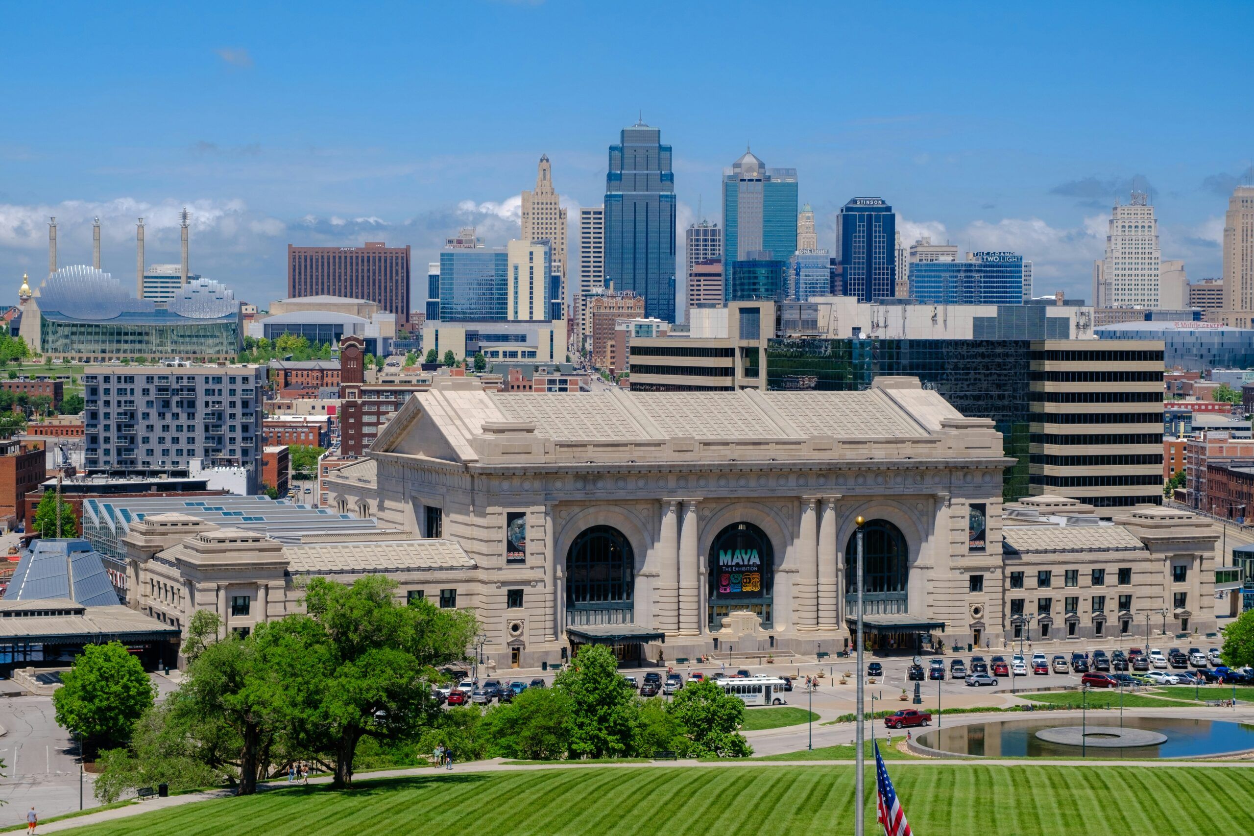 Union Station in Kansas City with the downtown skyline in the background on a sunny day.